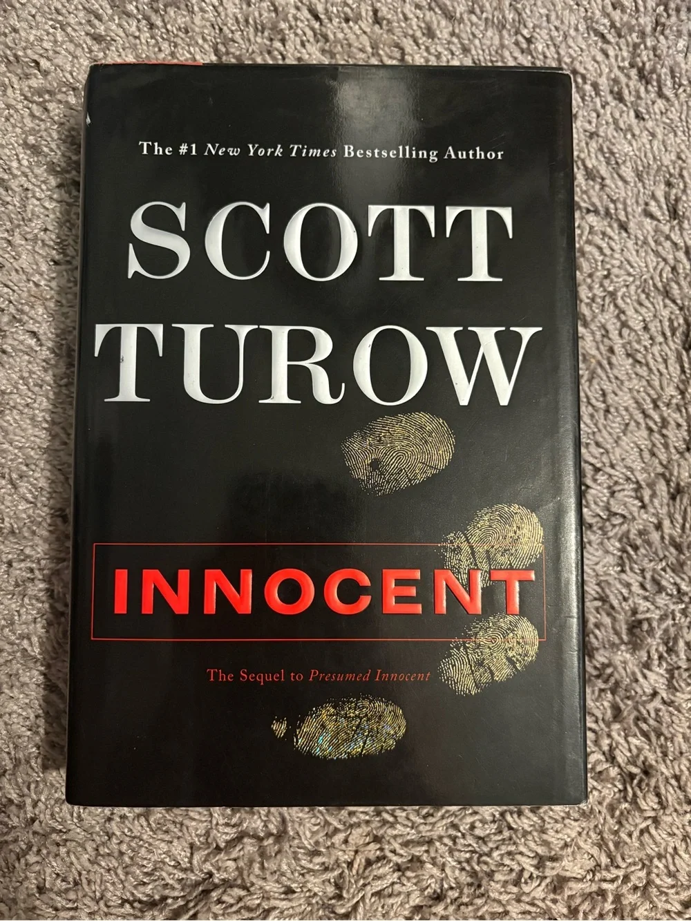 Target Black Hardcover 'Innocent' with Red Title and Gold Accents